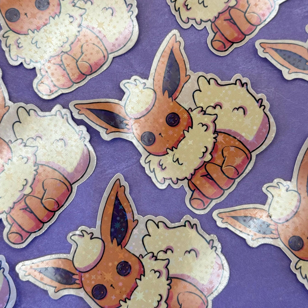 Plushie Fire Dog - holographic finish - cute virtual pet inspired die cut sticker
