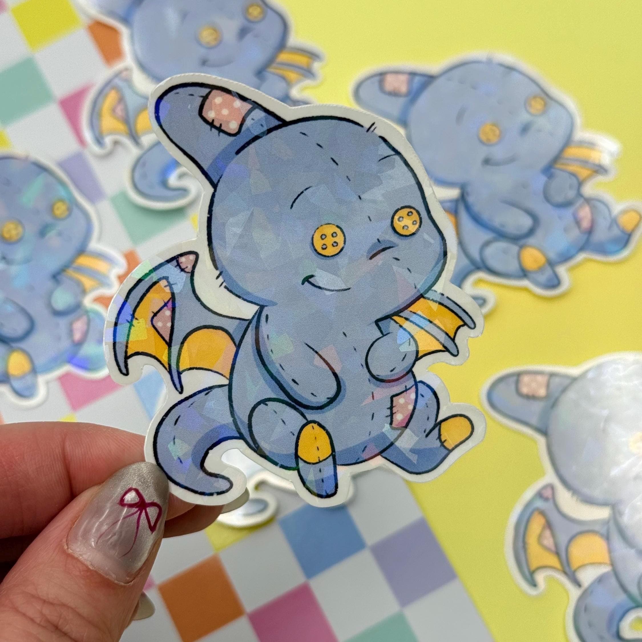 Plushie Dragon - holographic finish - cute virtual pet inspired die cut sticker
